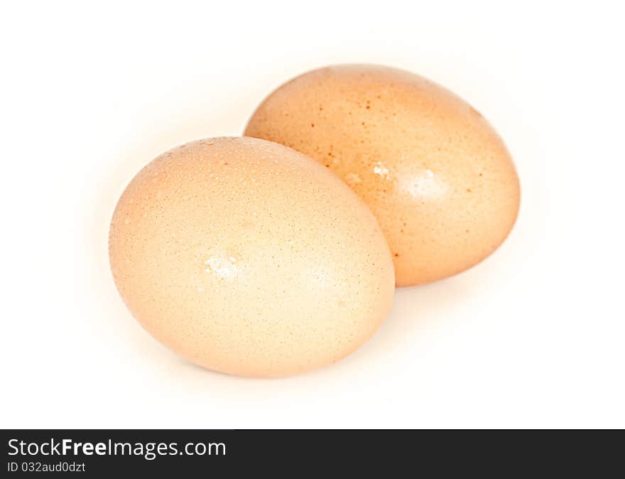 Two eggs on white background