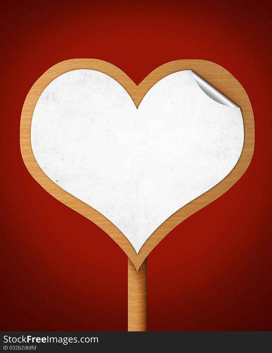 Blank sign in heart shape with white paper stick on it. Blank sign in heart shape with white paper stick on it