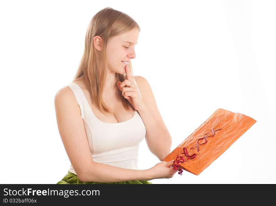 Young woman sit with gift bag