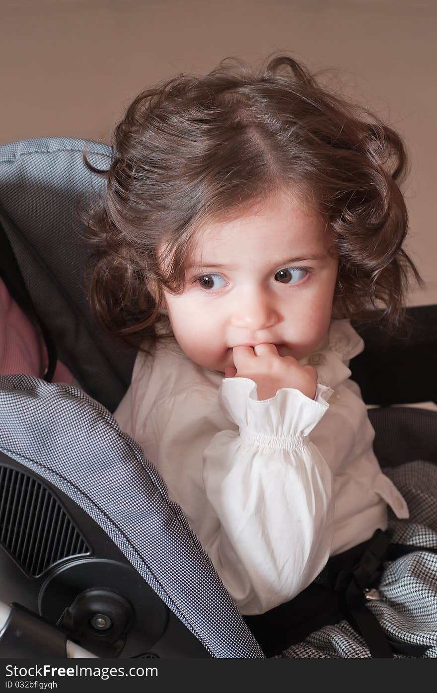 The little girl with the big expressive eyes and wavy hair. The little girl with the big expressive eyes and wavy hair.