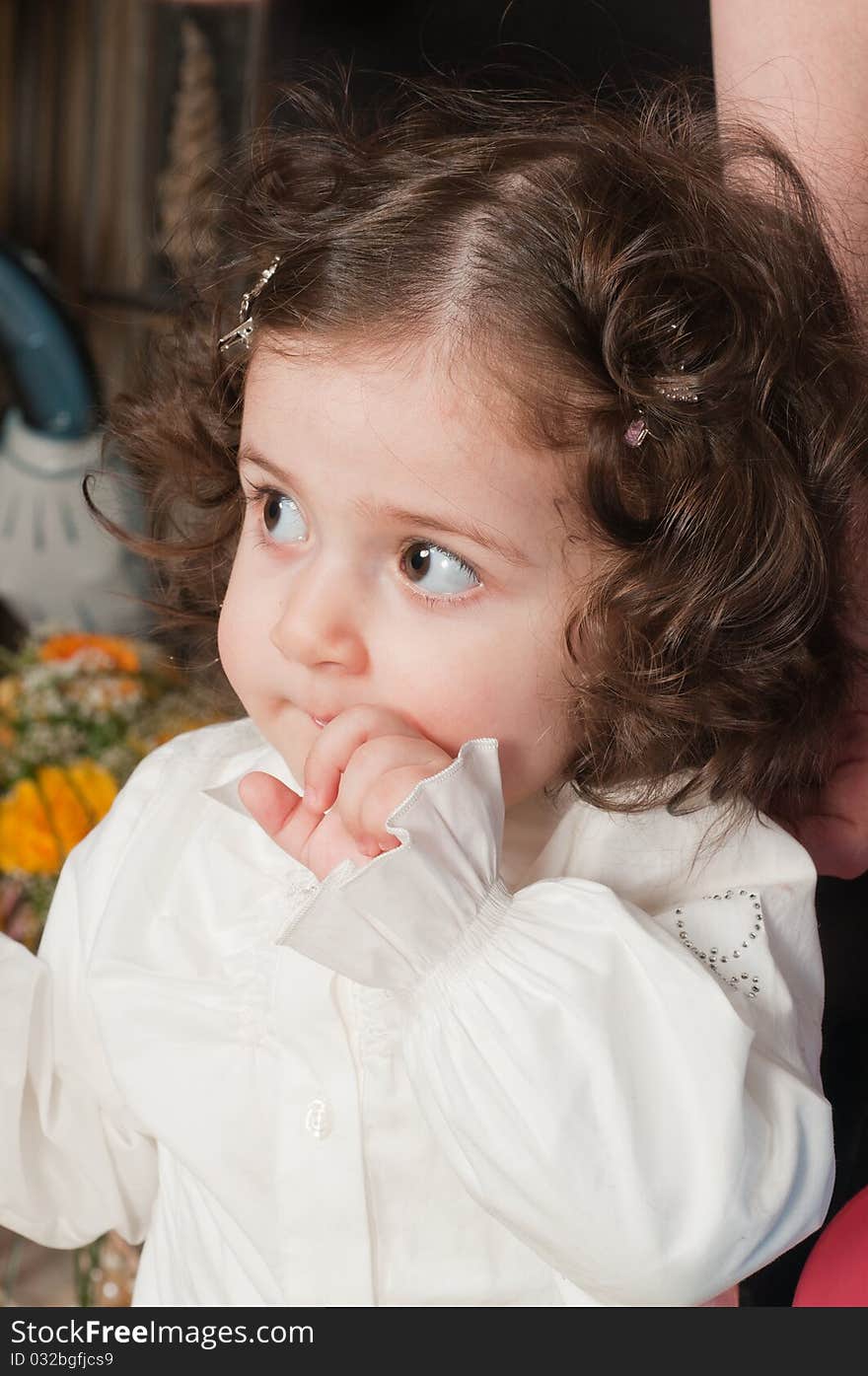 The little girl with the big expressive eyes and wavy hair. The little girl with the big expressive eyes and wavy hair.