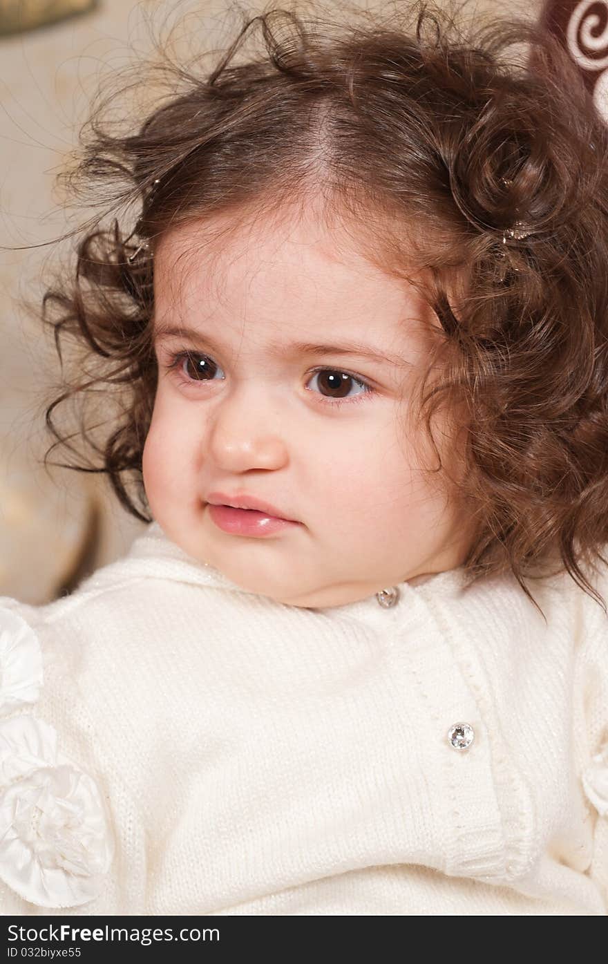 The little girl with the big expressive eyes and wavy hair. The little girl with the big expressive eyes and wavy hair.