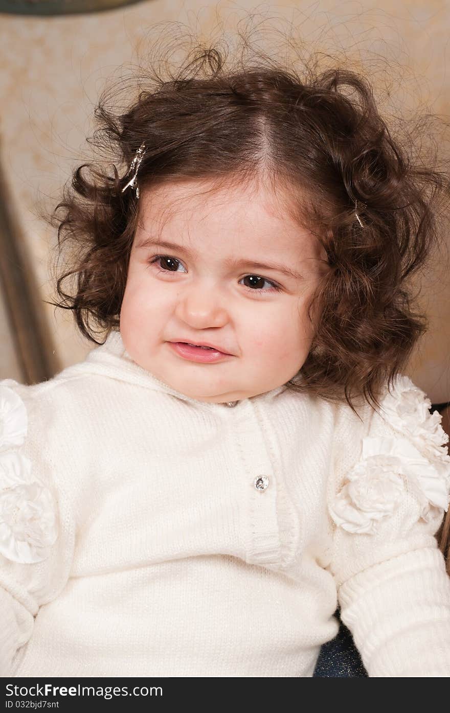 The little girl with the big expressive eyes and wavy hair. The little girl with the big expressive eyes and wavy hair.