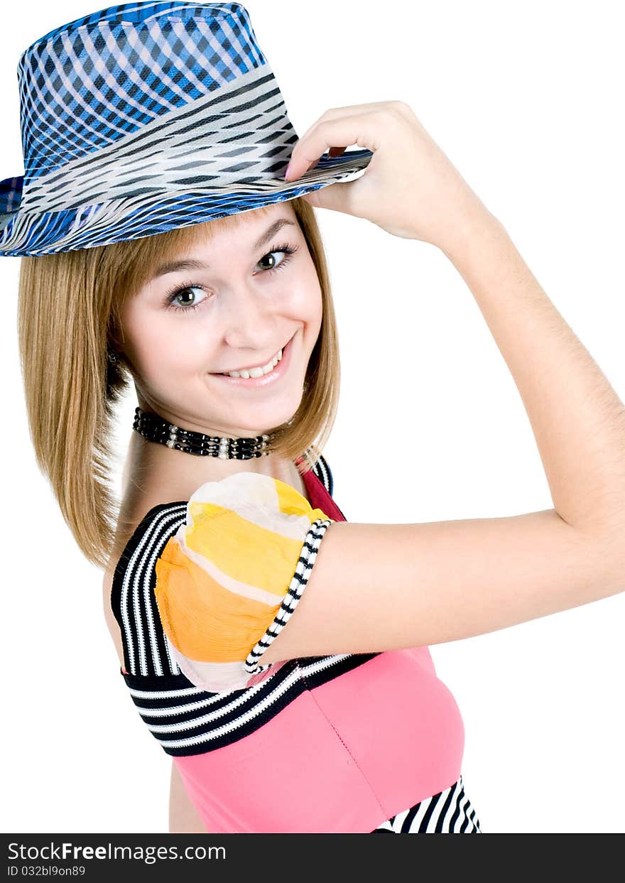 A cute teen girl tipping her hat, isolated