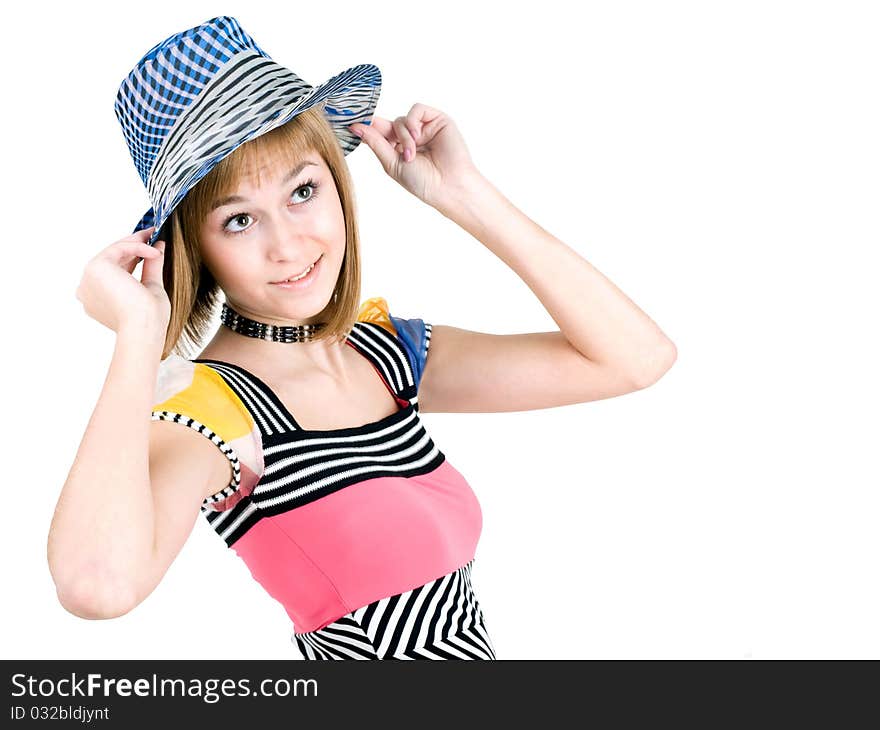 A cute teen girl tipping her hat, isolated