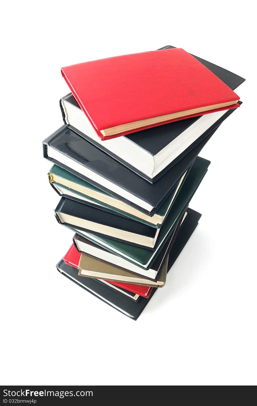 Stack of books isolated on white background, view from above