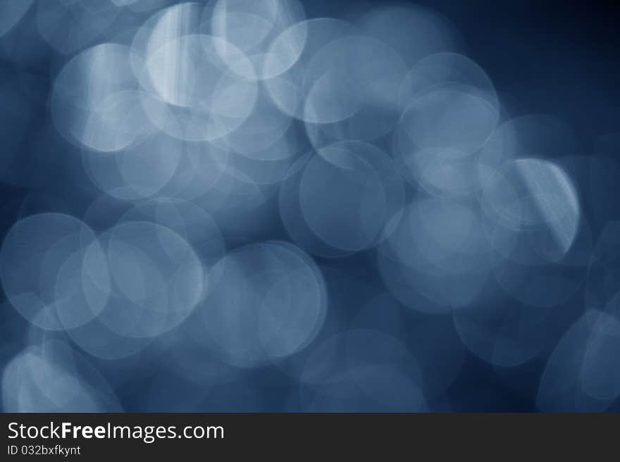 Dark blue bokeh abstract background