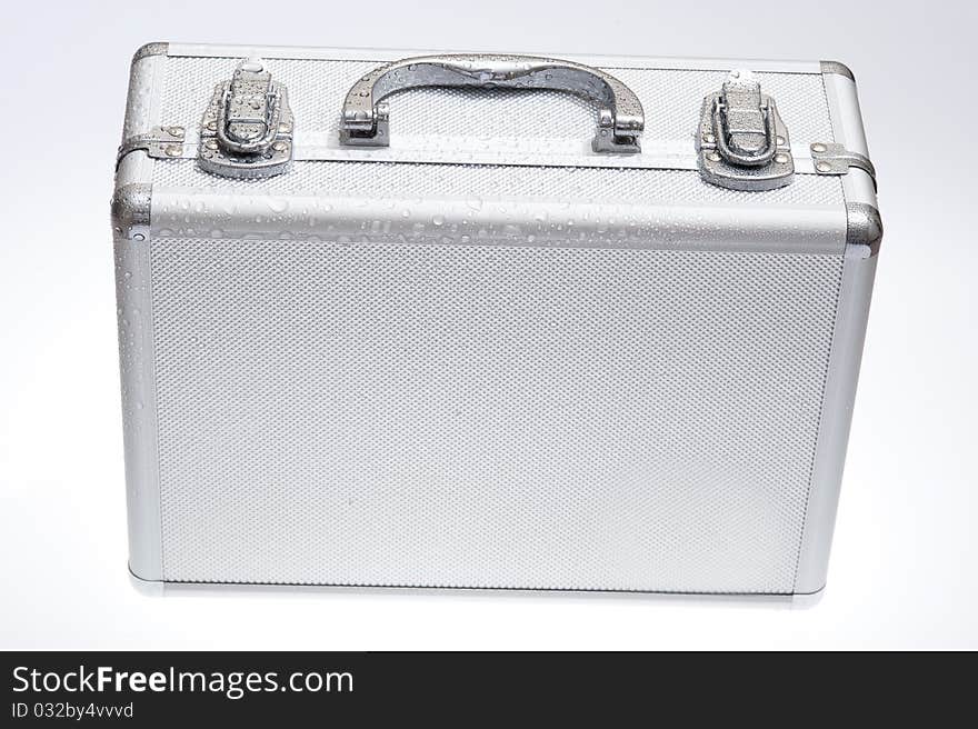 Metal suitcase isolated on the white background