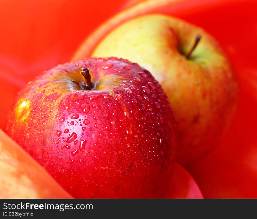 Fresh apple with water drops