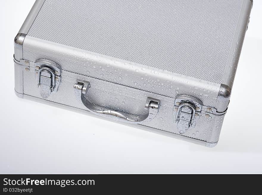 Metal suitcase isolated on the white background