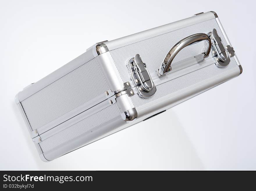 Metal suitcase isolated on the white background