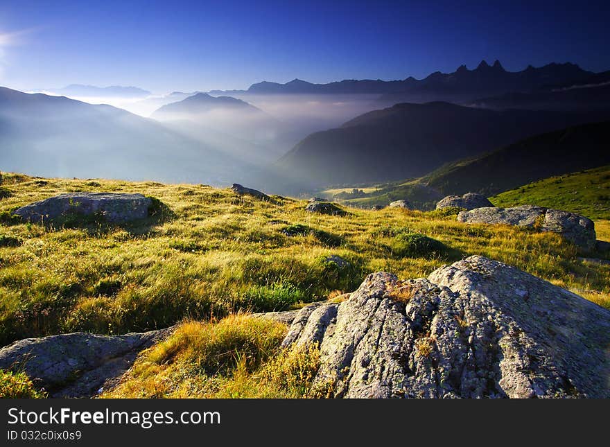 View over Aiguilles d'arve in oisans near the Guichard lake by a sunny day, France. Magic light. View over Aiguilles d'arve in oisans near the Guichard lake by a sunny day, France. Magic light.