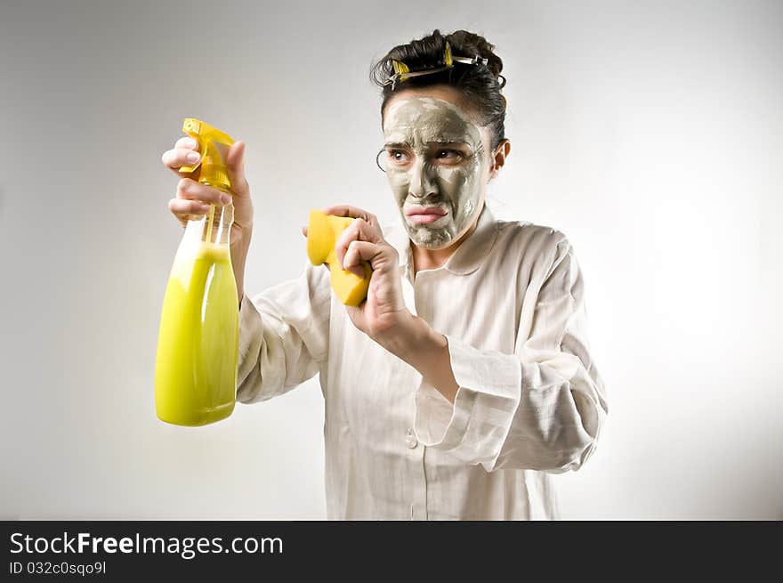 Disgusted housewife using a detergent