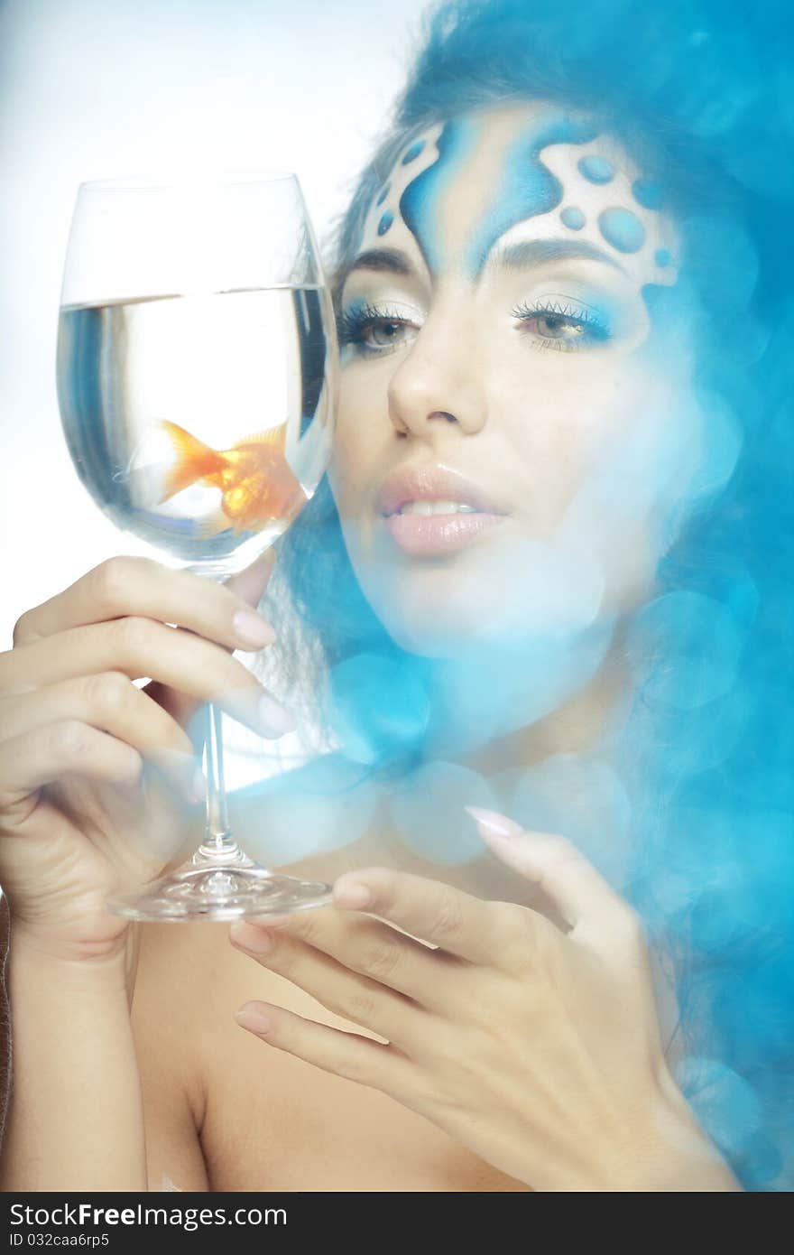 Girl With Makeup, With A Fish In A Glass