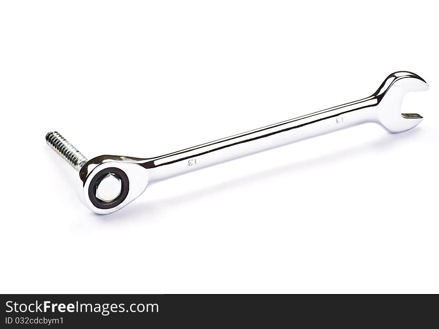 Stainless Steel Wrench and bolt over white background. Stainless Steel Wrench and bolt over white background