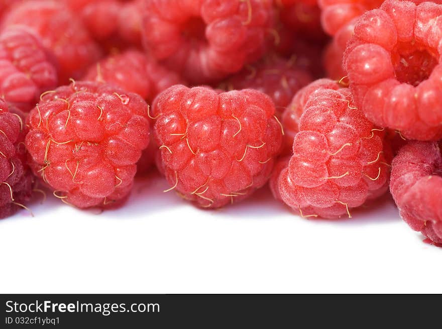 Fresh raspberry isolated on white background