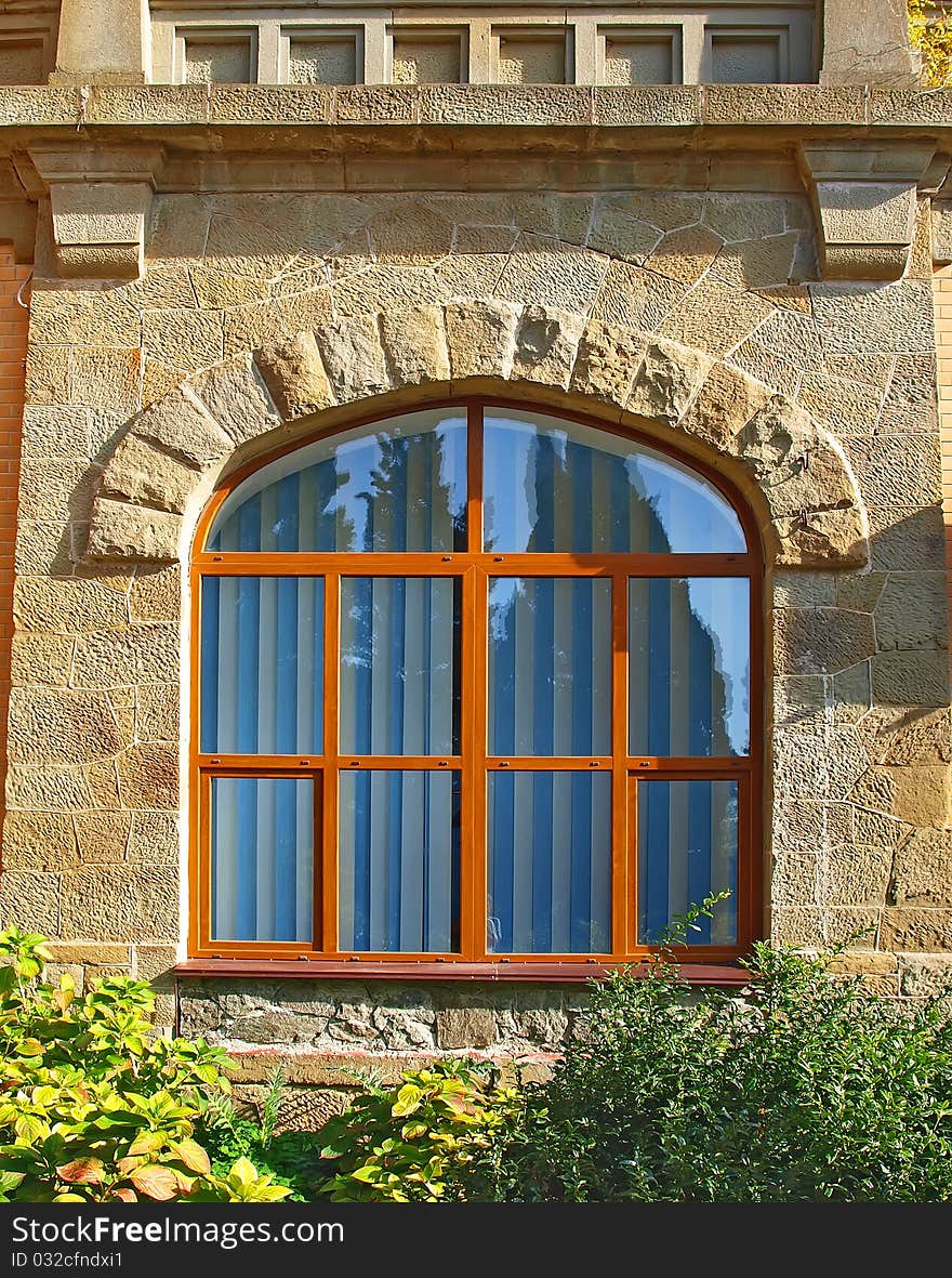 Big window on the wall of a historical castle. Big window on the wall of a historical castle