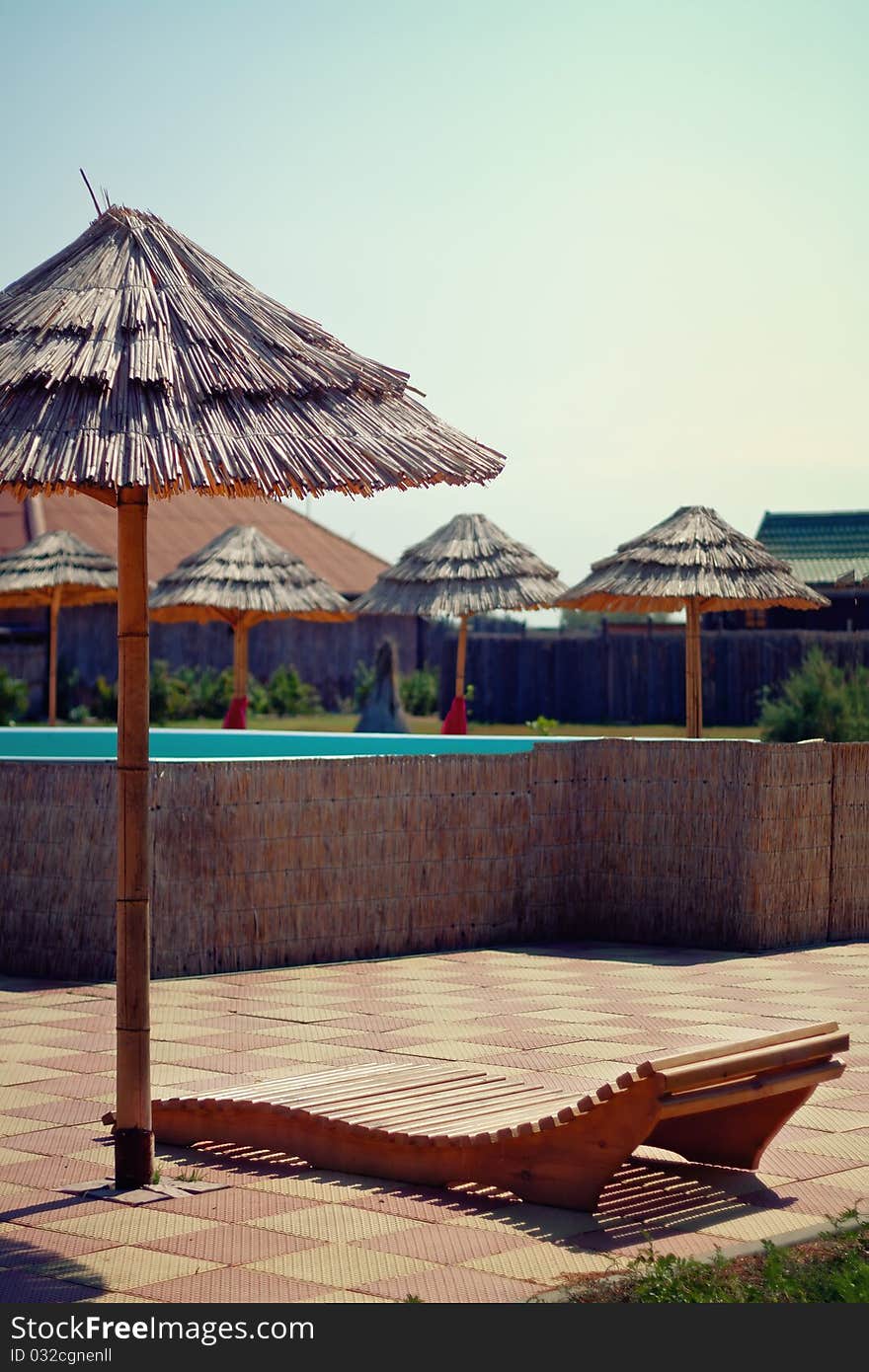 Deckchair and umbrella for a pleasant break from the summer heat