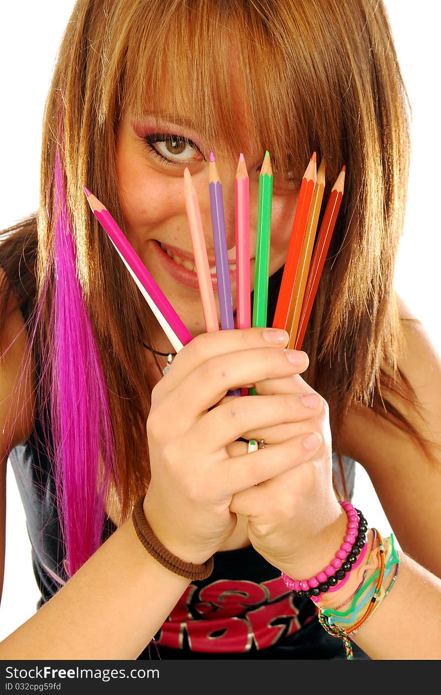 001: A girl plays with colored pencils on white background. 001: A girl plays with colored pencils on white background