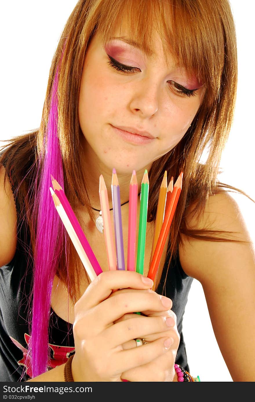 002: A girl plays with colored pencils on white background. 002: A girl plays with colored pencils on white background