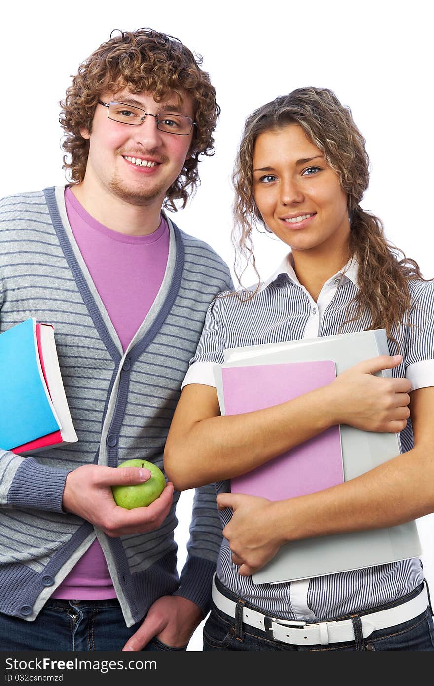 Students: boy and  girl with notebooks and books smiling on white background