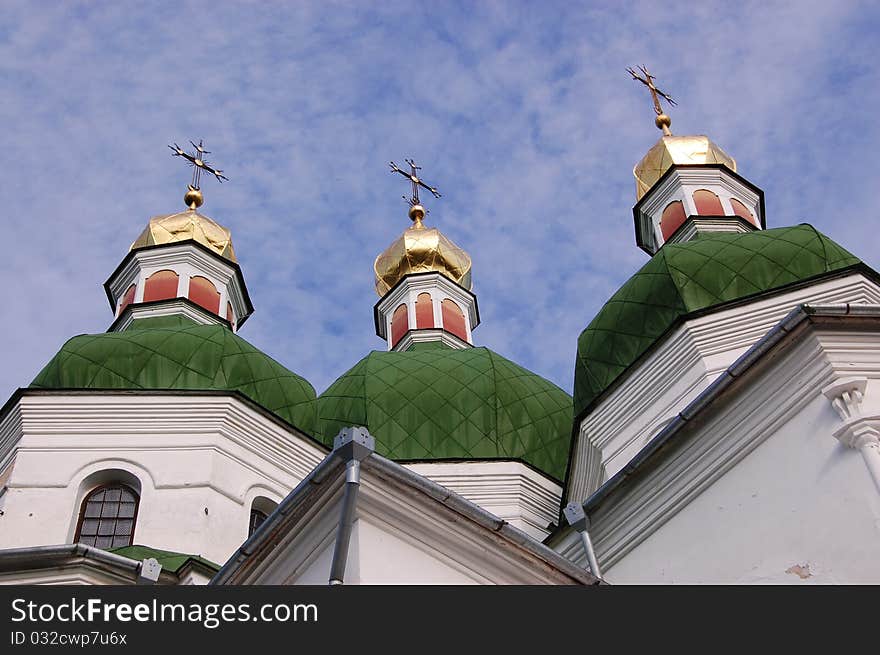 Beautiful Ukrainian church on blue sky background. Beautiful Ukrainian church on blue sky background