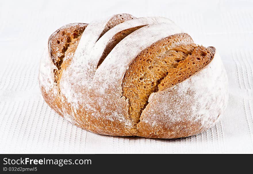 Homemade white bread lying on a napkin