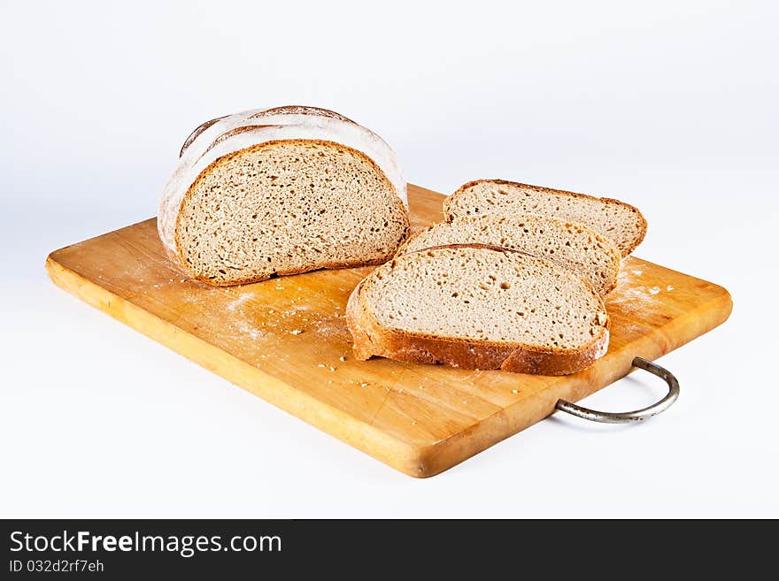 Сut bread lying on a chopping board