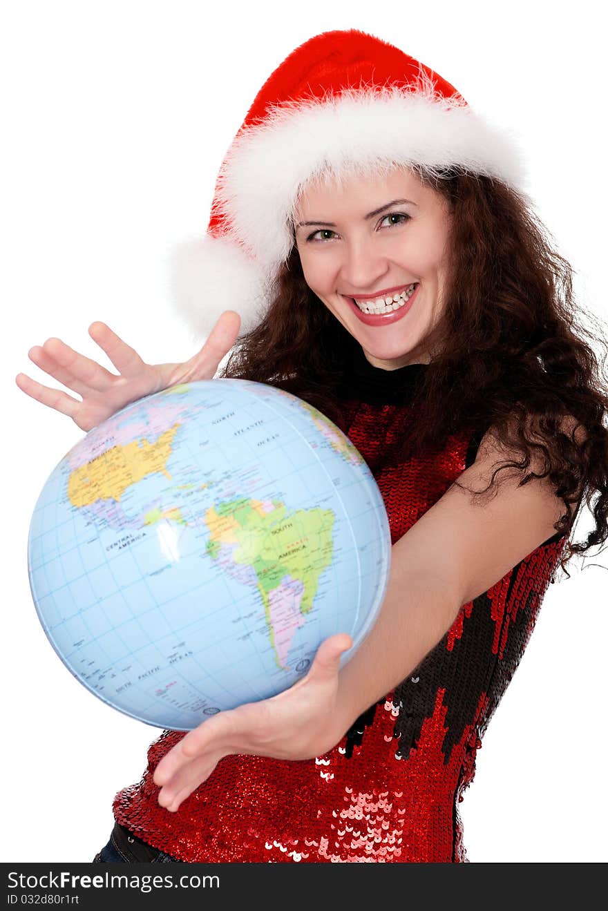 Smiling christmas girl holding globe wearing Santa hat. Isolated on white background. Smiling christmas girl holding globe wearing Santa hat. Isolated on white background.