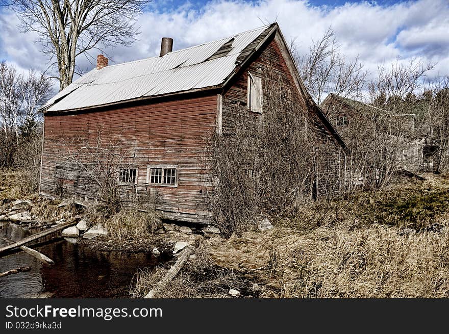 Abandoned Derelict Building overgrown with vines