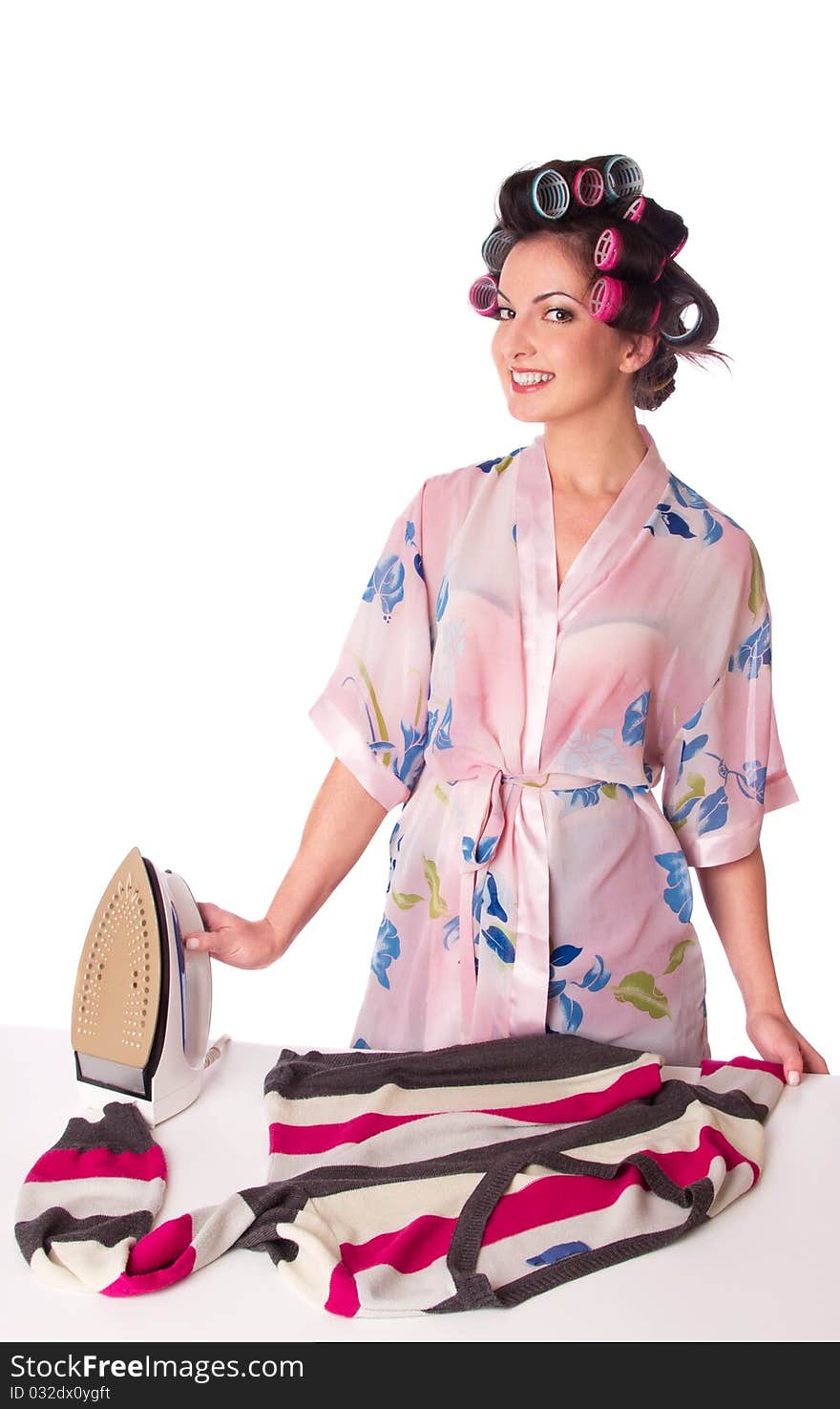 Woman is ironing clother