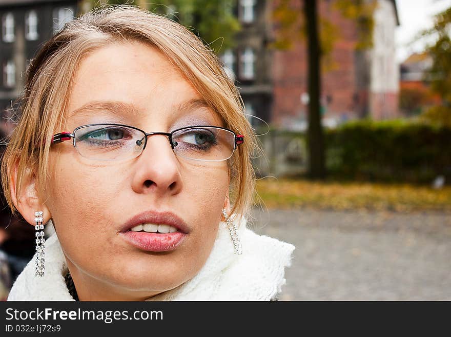 Nice blonde woman with earning and glasses. Nice blonde woman with earning and glasses