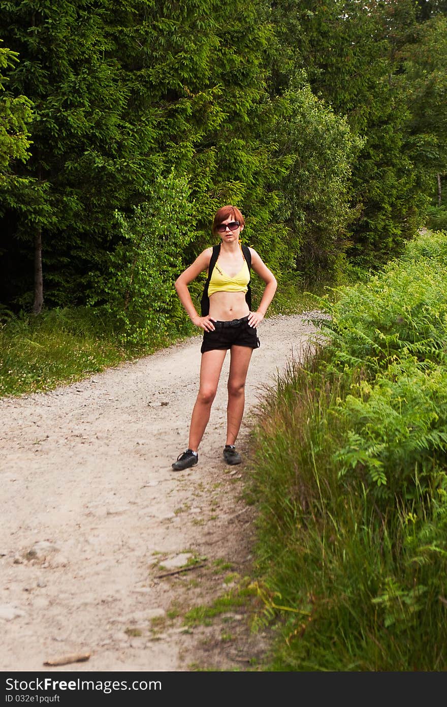 Woman resting during mountain trip. Woman resting during mountain trip