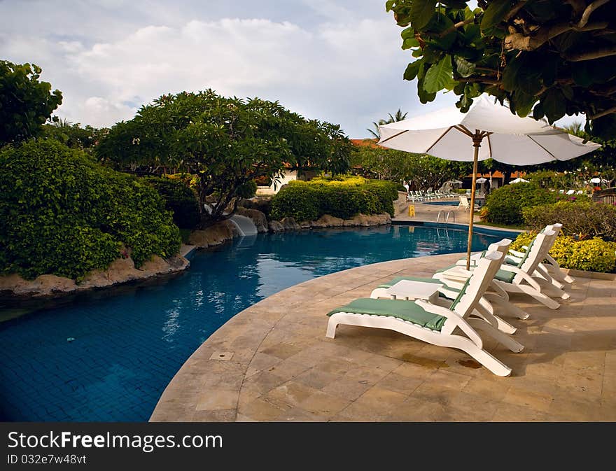 Pool with blue water in a garden