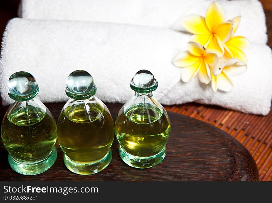 Bottles of essential oil in a spa composition