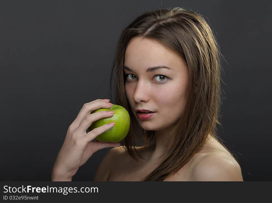 Beautiful woman posing with apple. Beautiful woman posing with apple