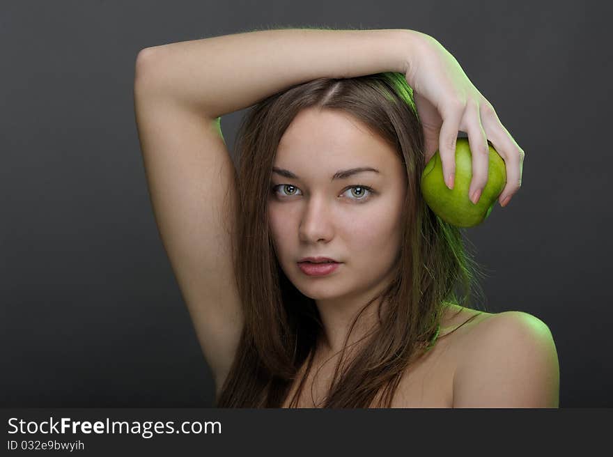 Beautiful woman posing with apple. Beautiful woman posing with apple