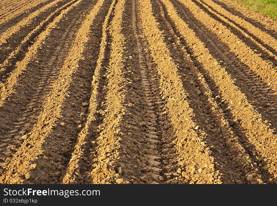 Background of newly plowed field