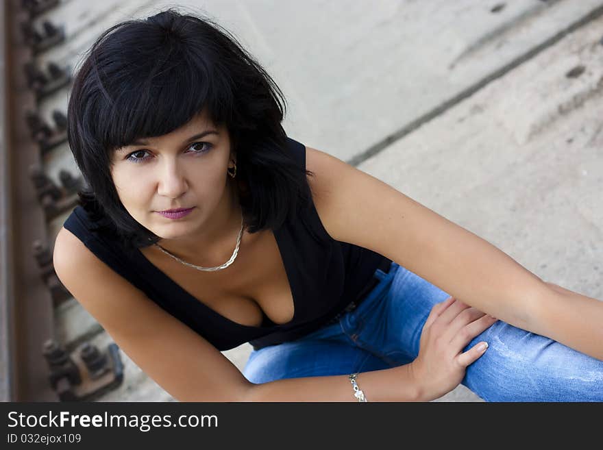 Beautiful brunette on the rails