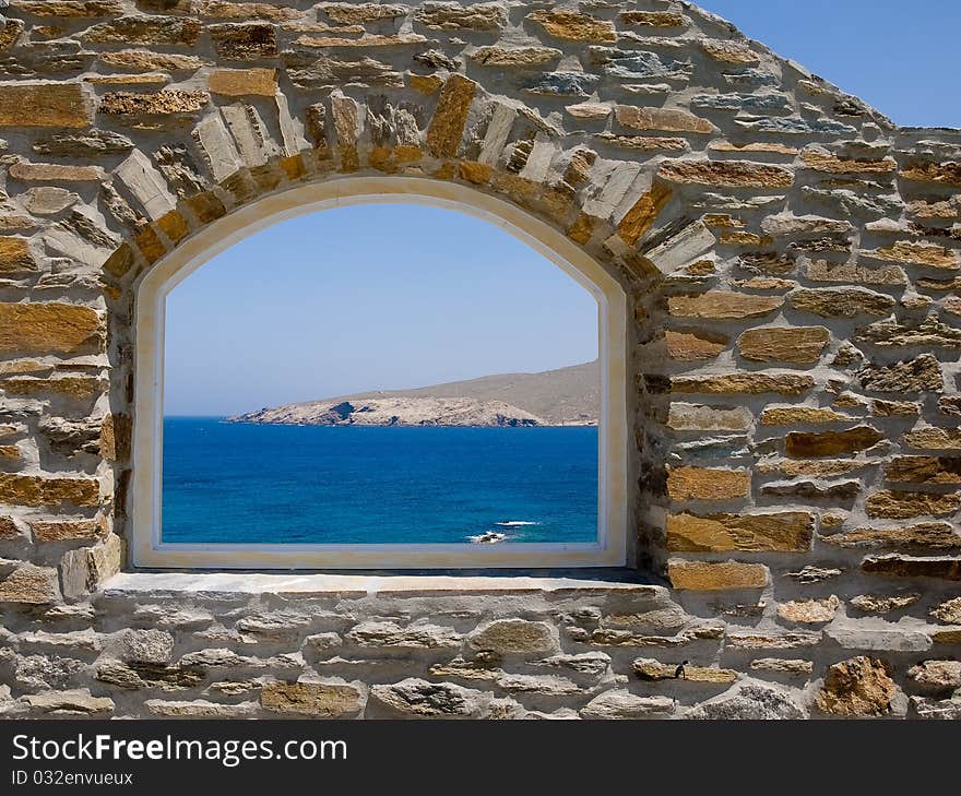 Arched window overlooking the beauty sea. Arched window overlooking the beauty sea.