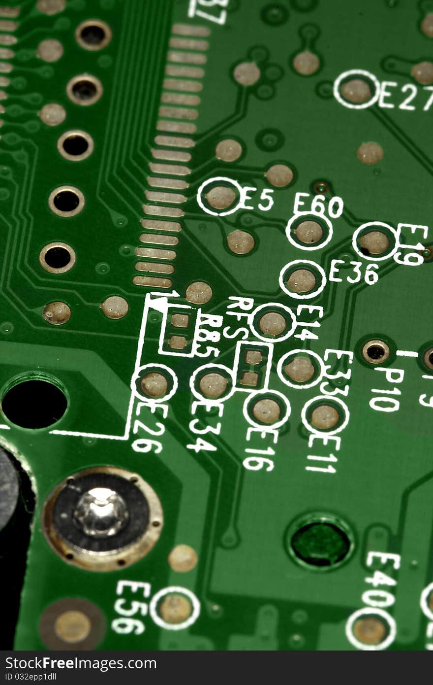 Close view detail of a green computer circuit board.