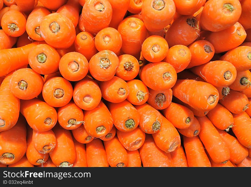 Hundred of red carrots stack up nicely for background usage.