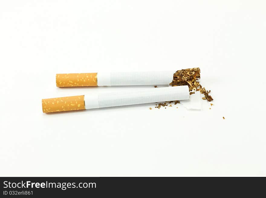 Broken cigarette isolated on white