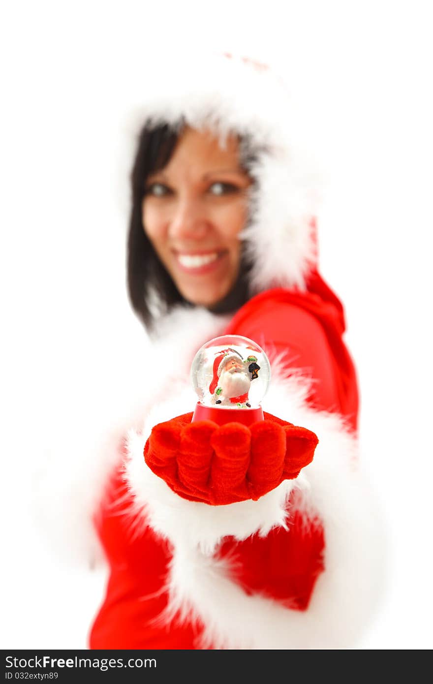 Sexy Christmas woman offering a Santa Claus figure in her hand. Sexy Christmas woman offering a Santa Claus figure in her hand