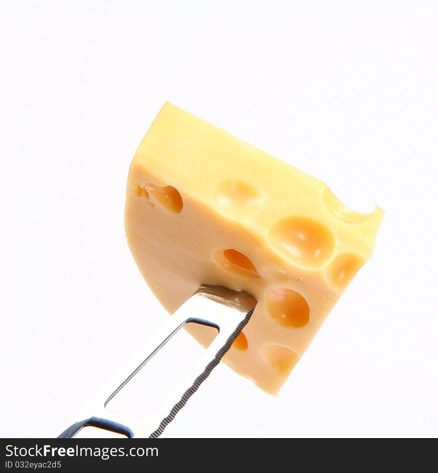 Some cheese on a cheese knife