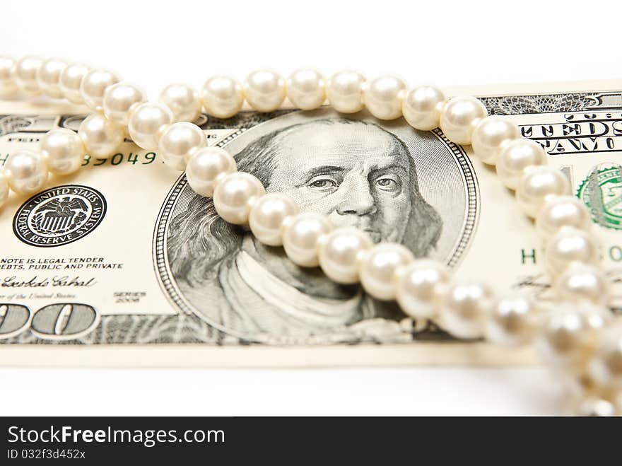 Pearls and dollars