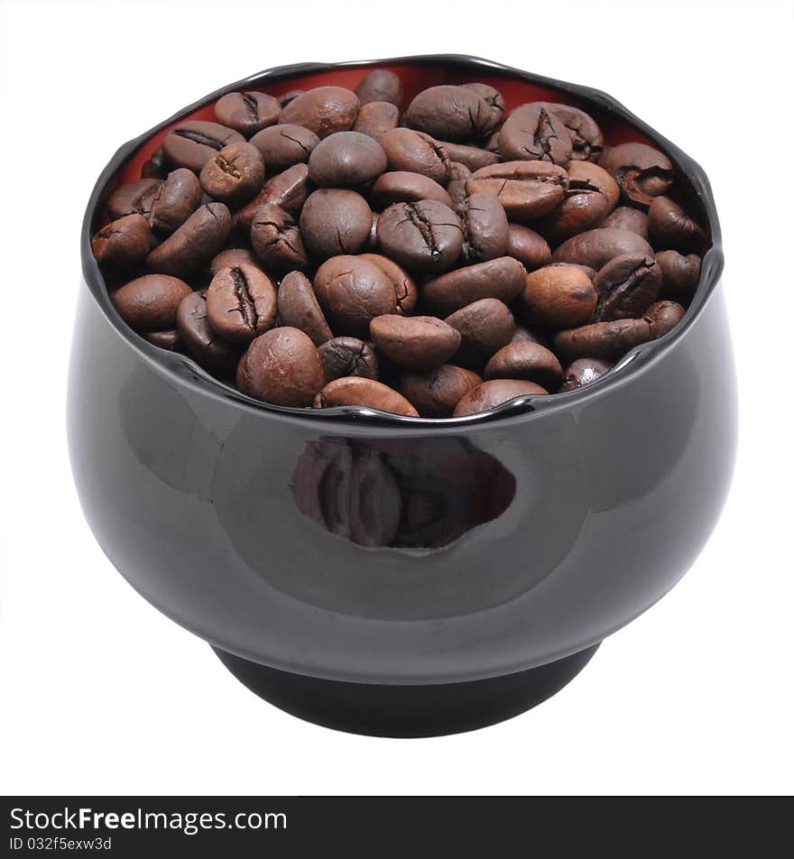 Grains of coffee are in a cup