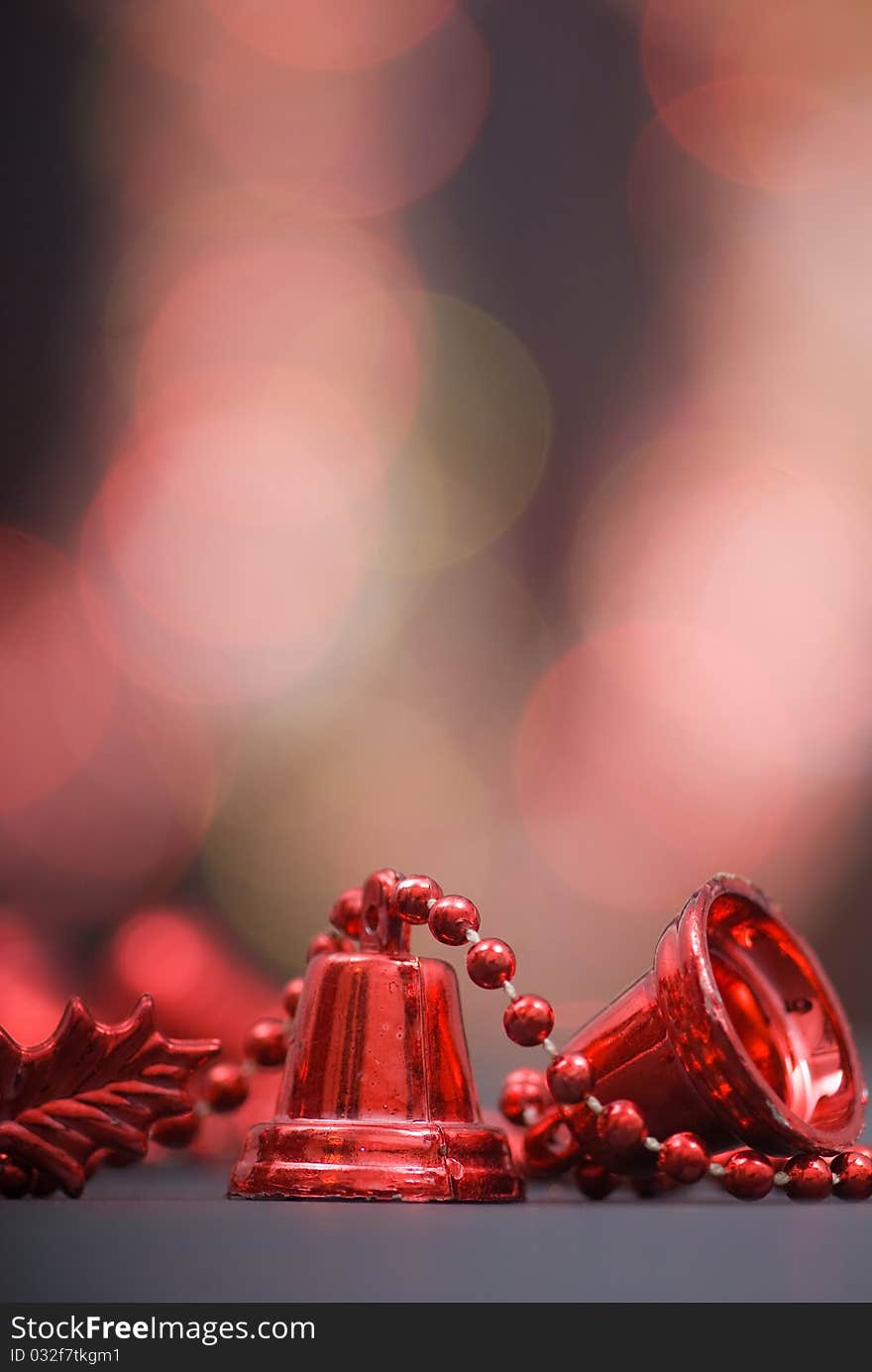 Christmas decoration with red bells and red beaded garland