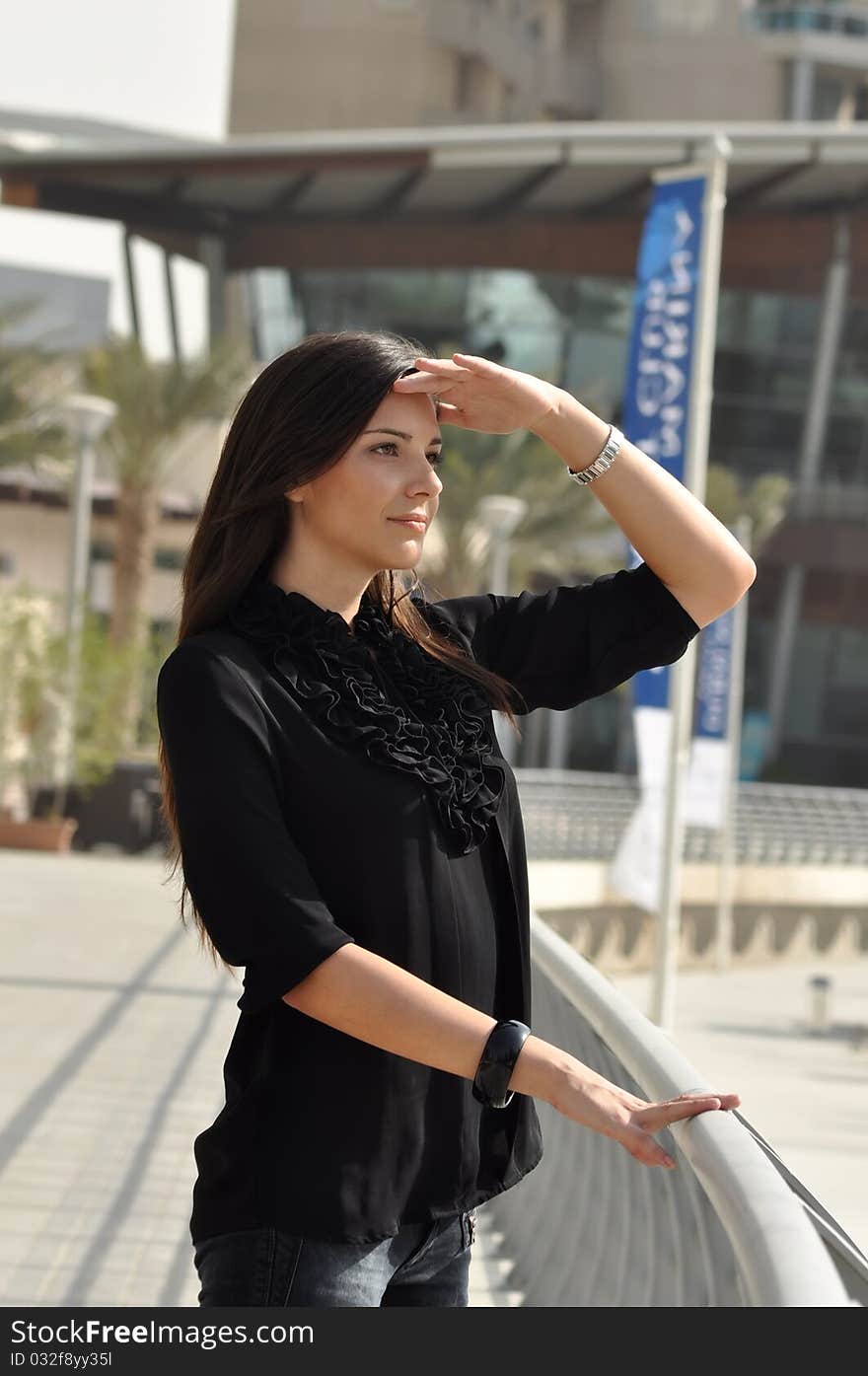 Young Beautiful Woman Looking Away On Quay