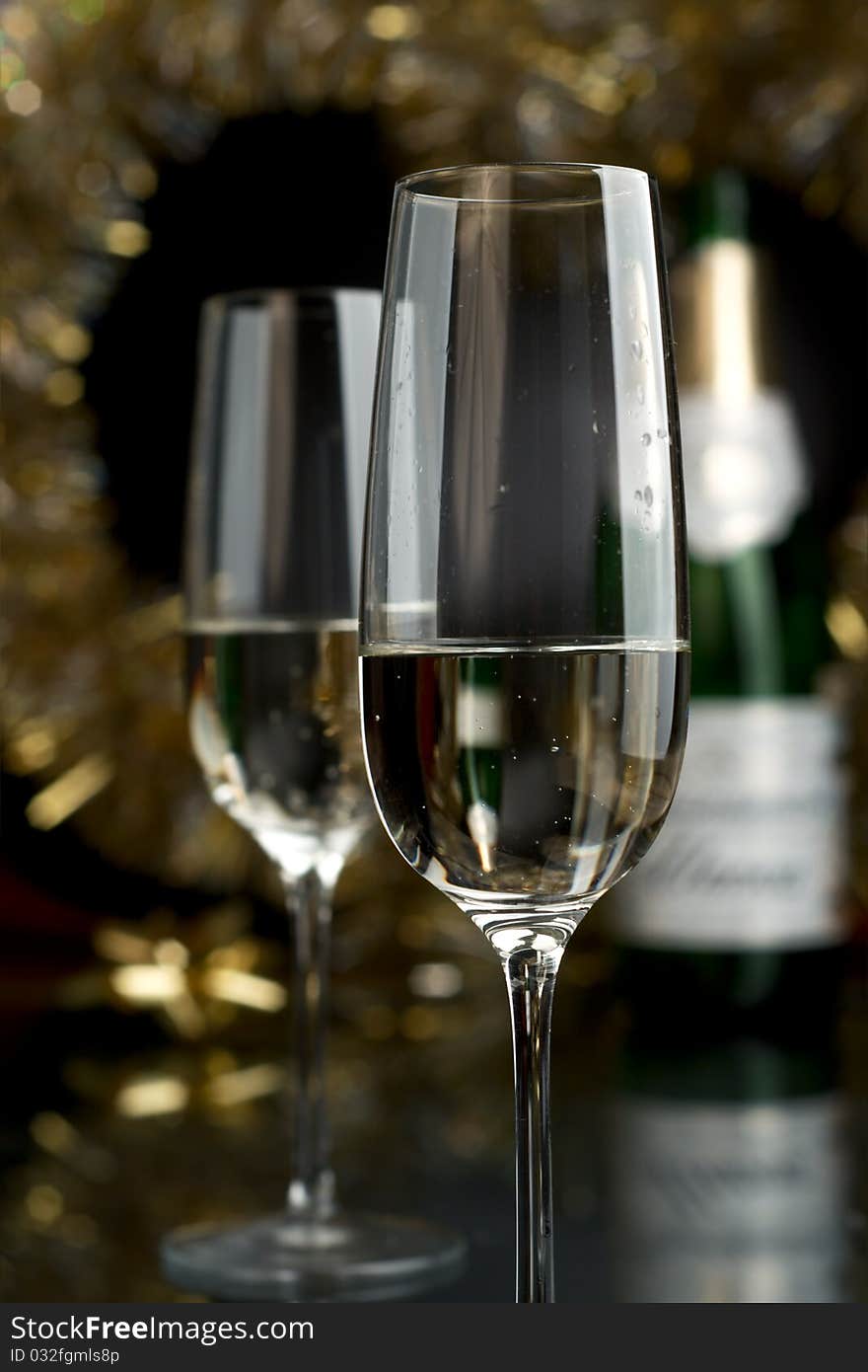 Champagne in glasses on a black background. Champagne in glasses on a black background